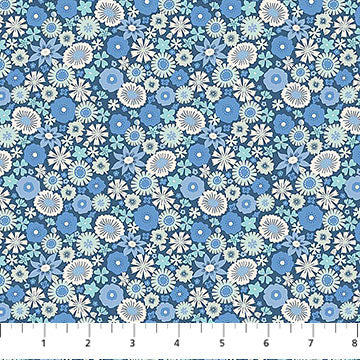Floral fabric pattern with blue and white flowers on a blue background