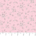 Floral pattern on a pink background with a ruler at the bottom.