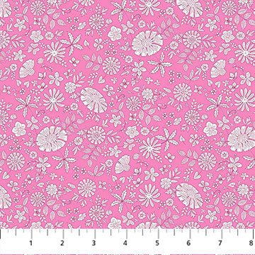 White floral pattern on a pink fabric background