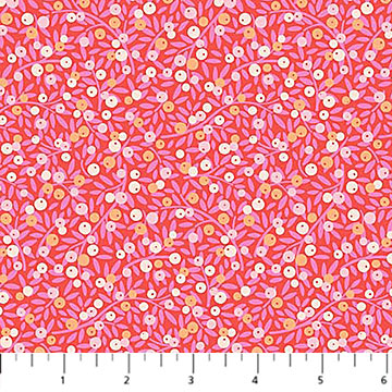 Pink floral fabric pattern with a ruler at the bottom