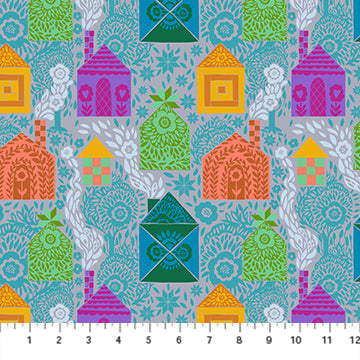Colorful pattern of stylized houses and geometric shapes on a fabric swatch.