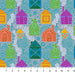 Colorful pattern of stylized houses and geometric shapes on a fabric swatch.