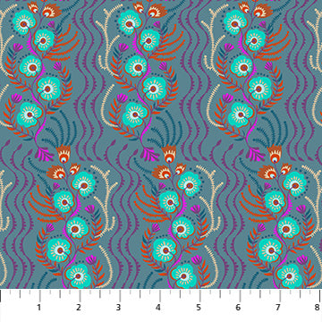 Patterned fabric with peacock designs on a blue background