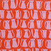 close up of fabric with hand drawn pink cats on a red background.