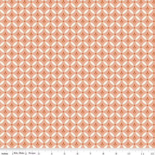 Fabric with geometric pattern on a pink background