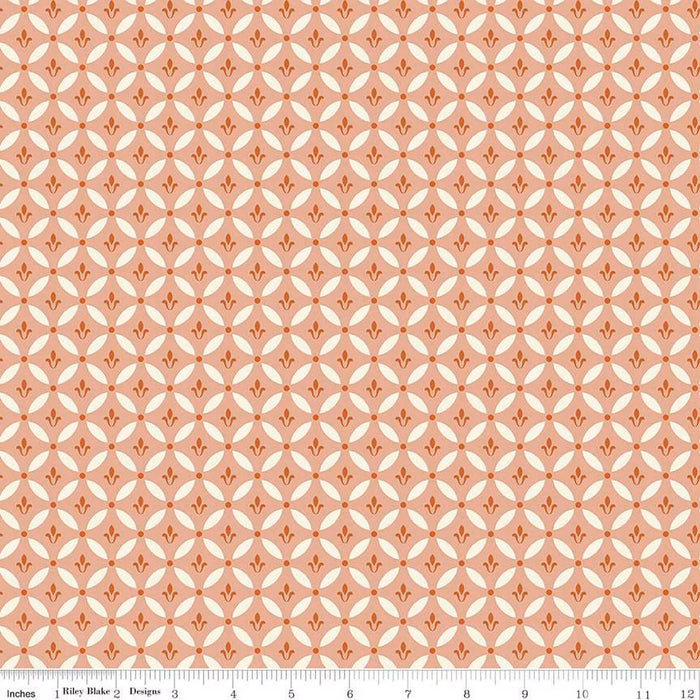 Fabric with geometric pattern on a pink background