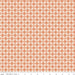 Fabric with geometric pattern on a pink background
