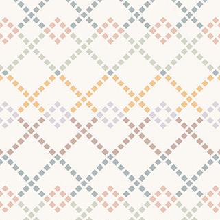 A grid of squares to look like diamonds in yellow, browns, blues and greens.