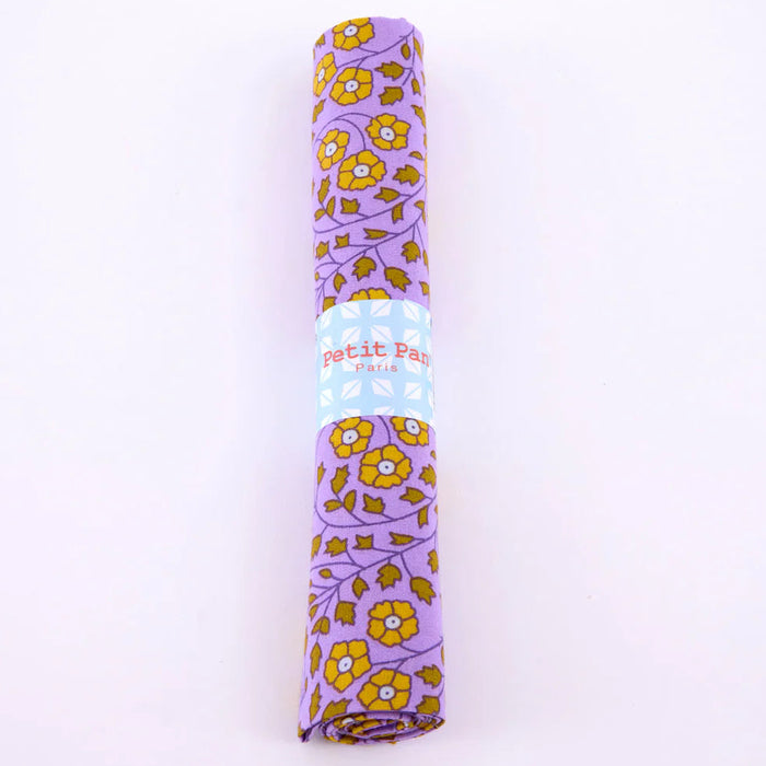 Folded fabric with floral pattern on a white background