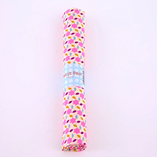 Roll of pink and blue patterned paper with a brand name on a white background