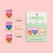 Set of 'Mama Made It' labels on a pink background