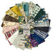 A circular arrangement of multiple patterned fabric or paper swatches in assorted colors and designs, including florals, botanicals, vintage typography, stripes, and abstract prints