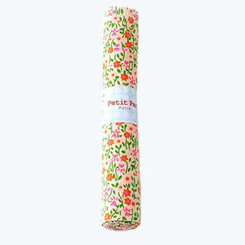 rolled fabric coupon with orange and pink flowers on buff background
