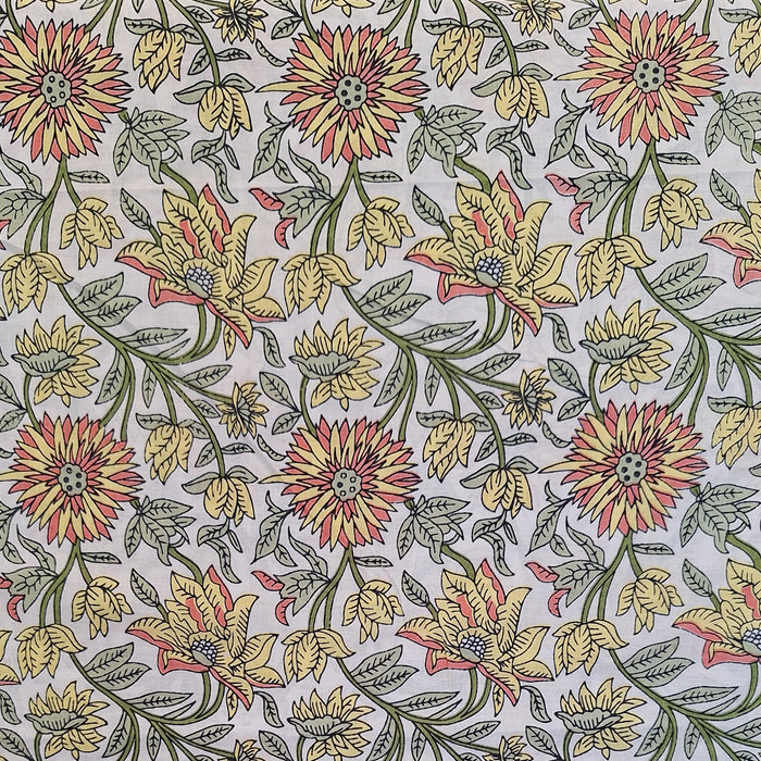 design of zinnias in yellow and orange with green vines on white background