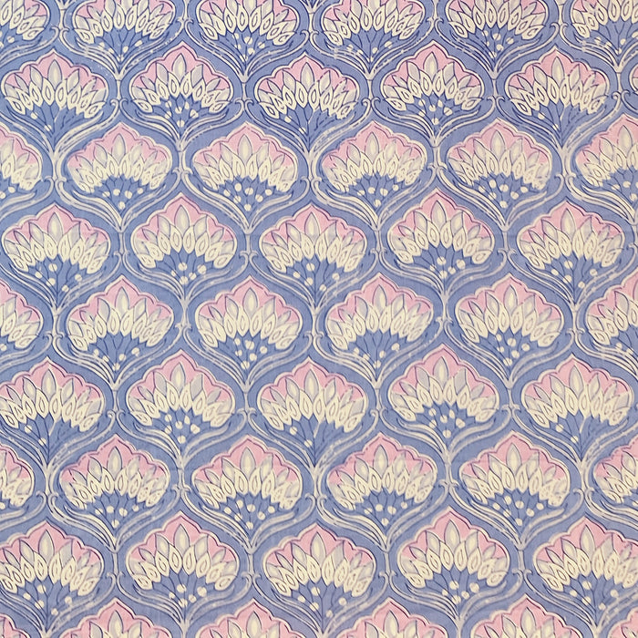 Close up of fabric pattern featuring a pink and white Lotus motif on pale blue background