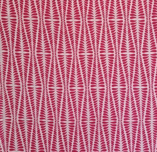 A close-up of a repeating fabric pattern featuring vertical wavy graphic in alternating bright pink and off-white sections.
