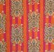 A close-up of a patterned fabric featuring repeated tiger illustrations in beige and black over vertical stripes of orange and bright pink.