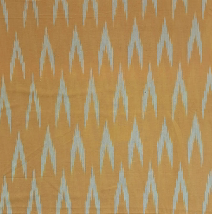Close up of Ikat Woven Cotton in Deep Yellow