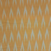 Close up of Ikat Woven Cotton in Deep Yellow
