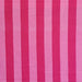 A close-up of a striped textile pattern with alternating vertical bands of bright magenta pink and light pink