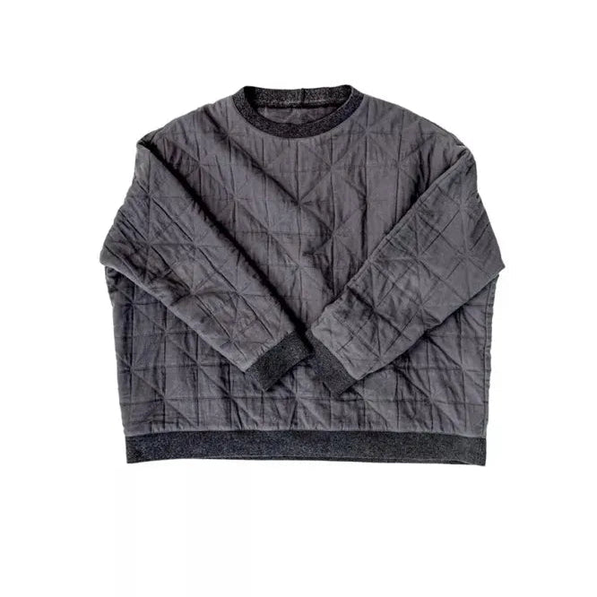 Quilted gray sweater on a white background
