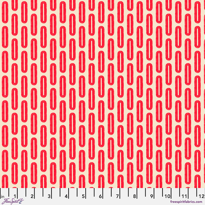 Red geometric pattern on a beige background with a ruler at the bottom.