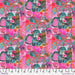 Colorful fabric pattern with elephants and flowers on a pink background, featuring a ruler for scale.