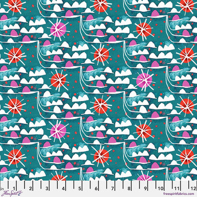 Patterned fabric with sailboats, suns, and clouds on a teal background, featuring a ruler at the bottom for scale.