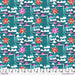 Patterned fabric with sailboats, suns, and clouds on a teal background, featuring a ruler at the bottom for scale.
