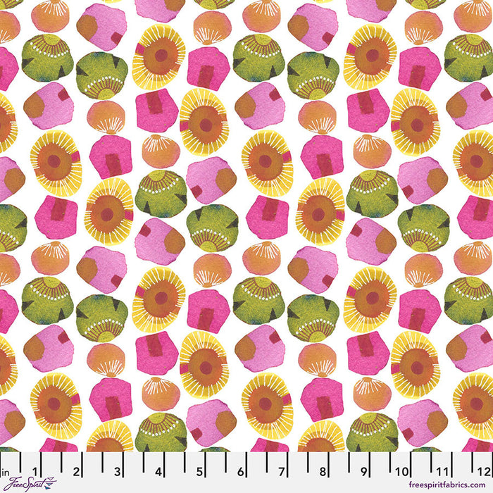 Colorful geometric pattern with a ruler for scale on a white background