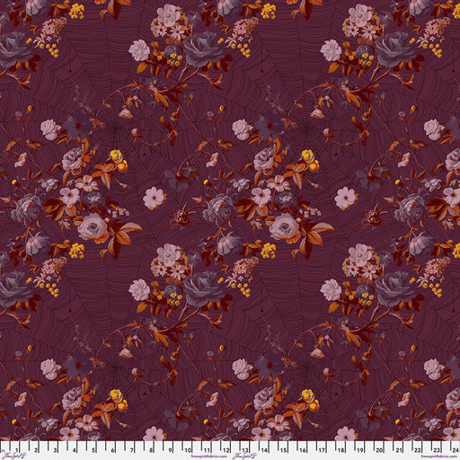 Floral pattern fabric swatch on a dark purple background