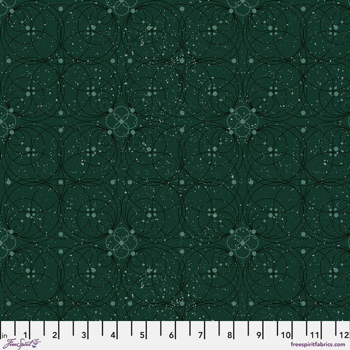 Dark green fabric with circular pattern and measurement scale at the bottom