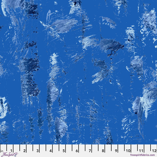 Blue fabric with abstract white and gray patterns, size ruler at the bottom.