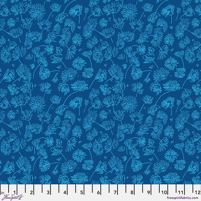 Blue floral pattern on a blue background with a ruler at the bottom.