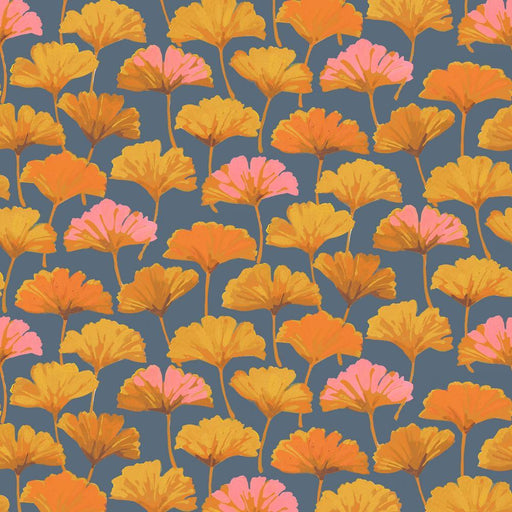 golden gingko leaves on a dark grey background