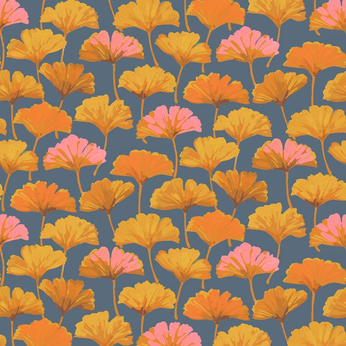 golden gingko leaves on a dark grey background