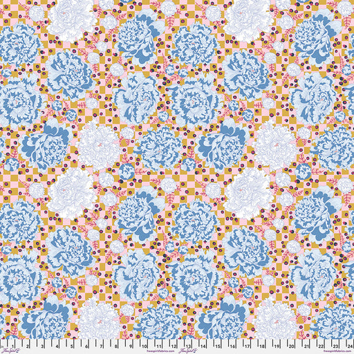 Patterned fabric with blue floral and geometric shapes on a checkered background