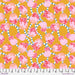 Pattern of pink and peach flowers with green leaves on a mustard yellow background, with a ruler at the bottom.