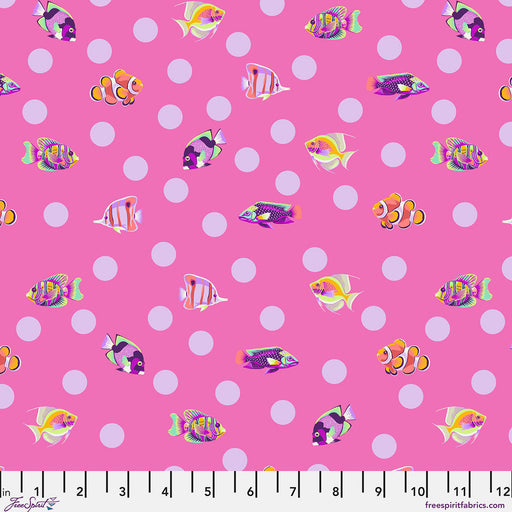 Fabric pattern with colorful fish on a pink background with white polka dots