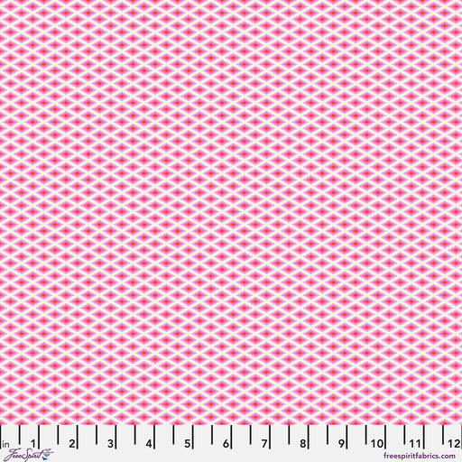 Pink fabric with a small geometric pattern, brand 'Free Spirit' visible