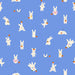 Pattern of white cartoon bunnies with carrots and strawberries on a blue background