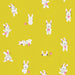 Pattern of cartoon bunnies with headphones on a yellow background