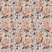 Patterned fabric with orange and black leaves on a beige background