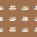 Pattern of vintage tea cups and saucers on a brown background