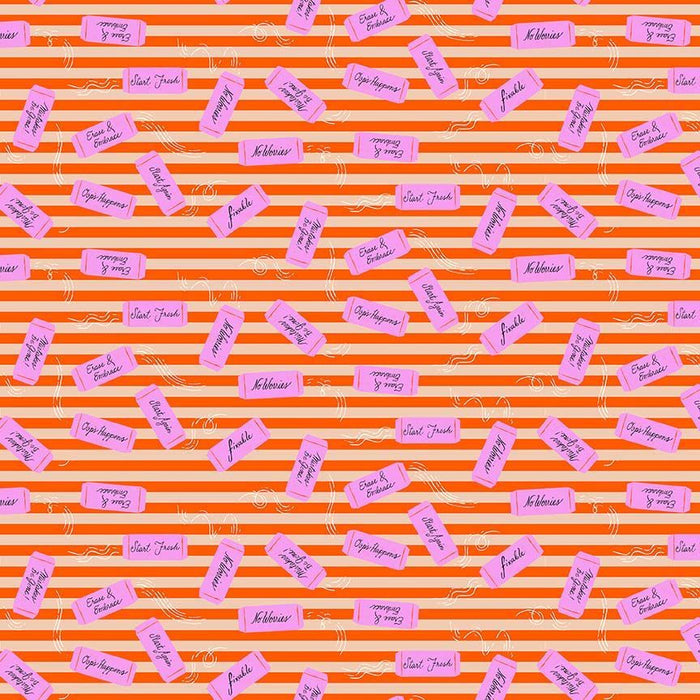 close up of red and white striped fabric with pink erasers randomly scattered on top.