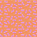 close up of red and white striped fabric with pink erasers randomly scattered on top.