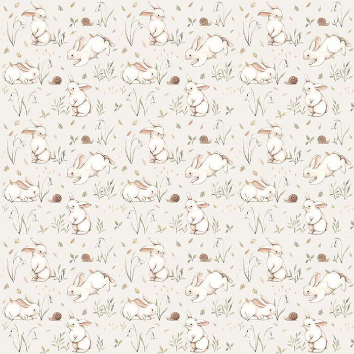 close up of fabric featuring little white and pink bunnies hopping around on a beige background