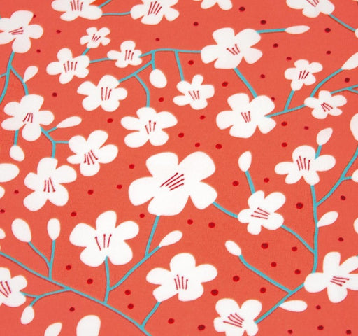 Pattern of white flowers on a red background with blue stems