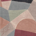 Abstract geometric fabric closeup with a modern mosaic pattern in muted dusty pink, sage green, slate gray, burgundy, and charcoal tones.