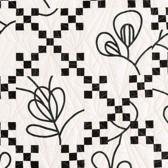 Black and white geometric pattern with abstract shapes on a light background